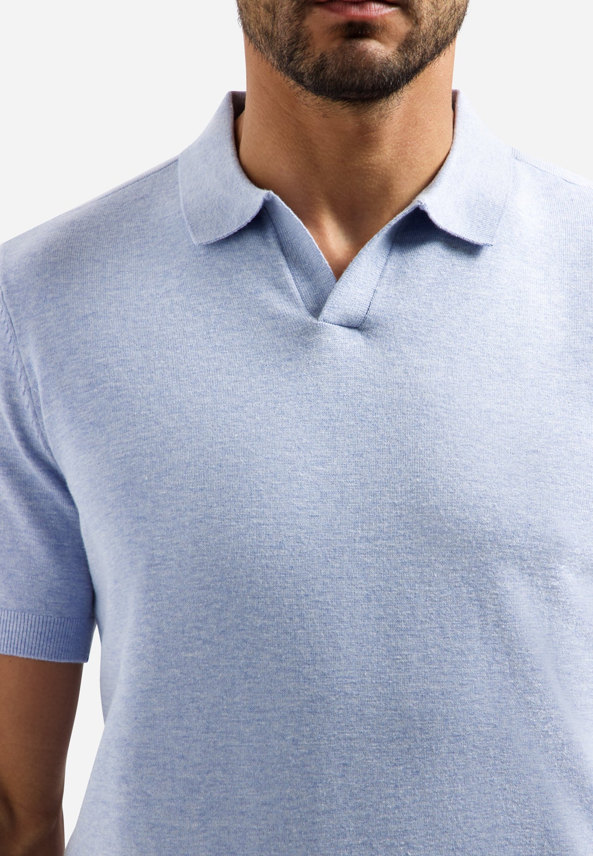 Knitted polo shirt with V-neck | Blue